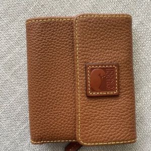 Dooney & Bourke Pebble Small Flap Wallet.